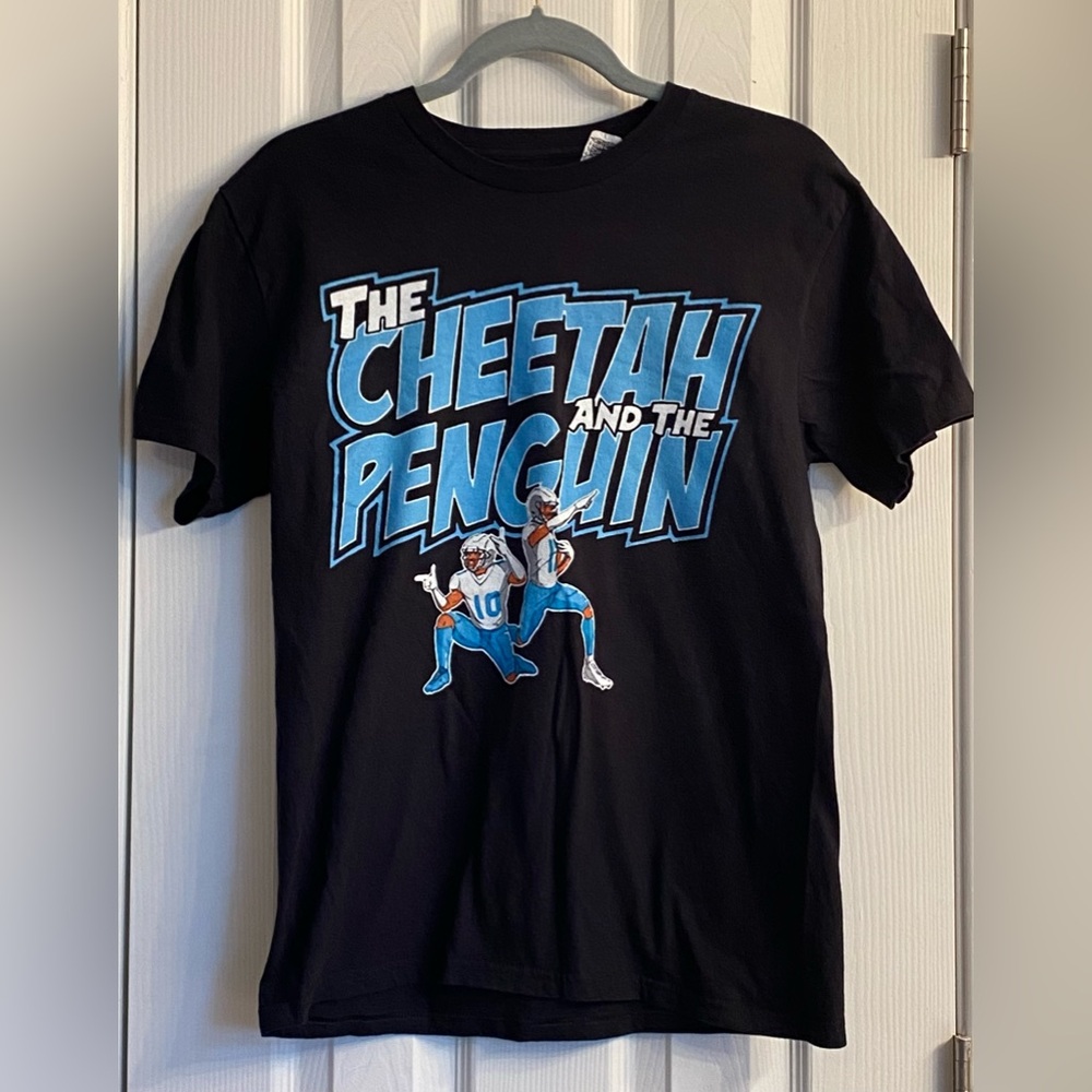 The Cheetah And The Penguin T-shirt, Adult Medium, in used condition